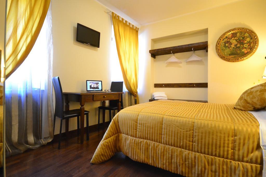 Case Brizi Asís Habitación foto